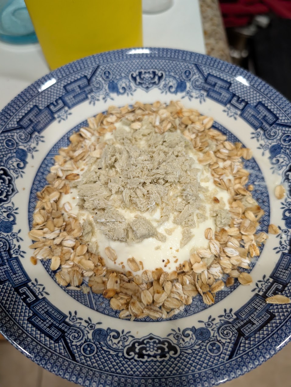 a bowl of homemade greek yogurt, toasted oatmeal and za&rsquo;atar halvah